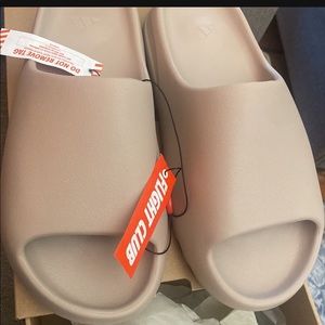 Brand new never worn from flight club yeezy slides size 12